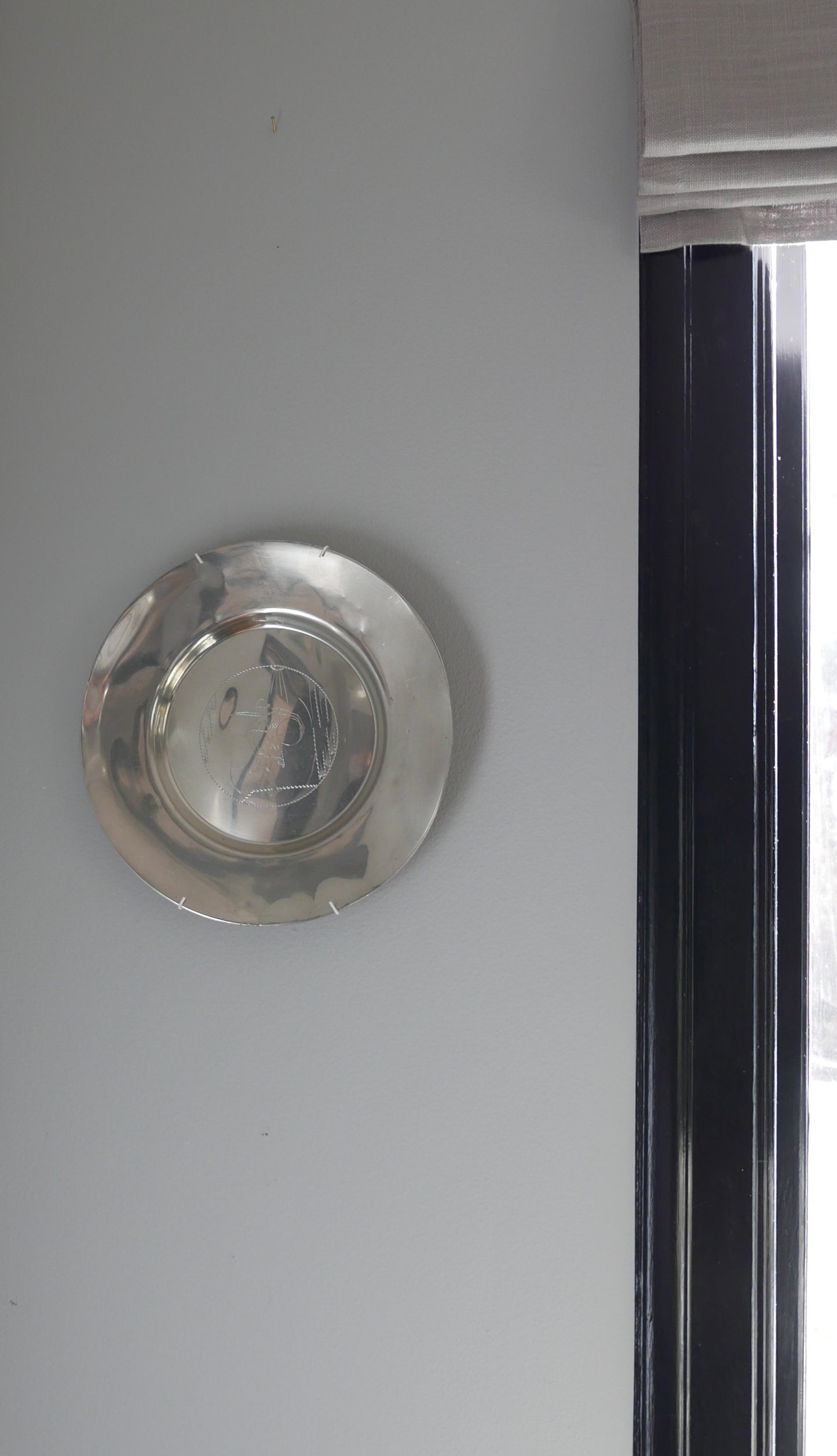 Pewter wall plate, 1931