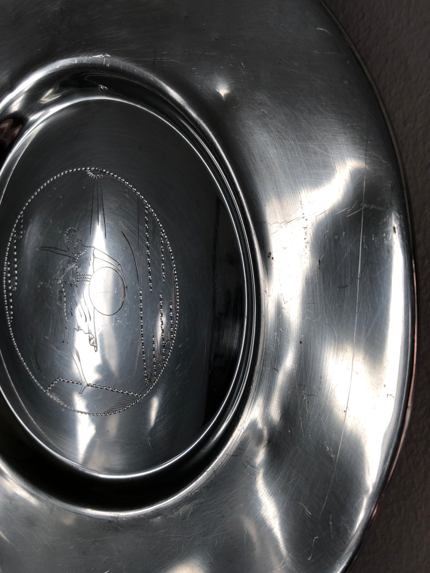 Pewter wall plate, 1931