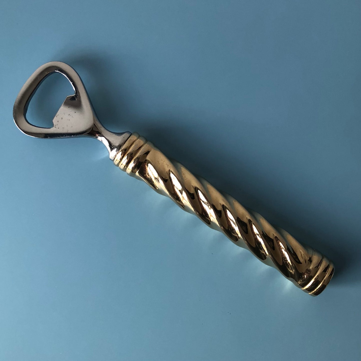 Gilded bottle opener