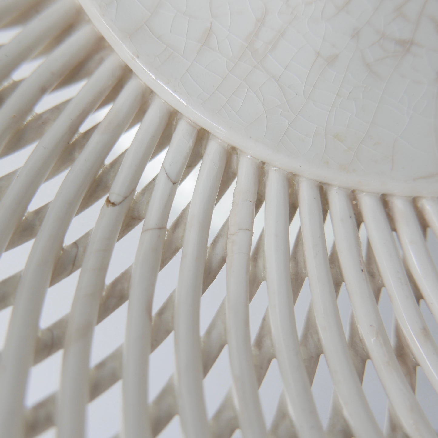 Footed woven porcelain fruit bowl